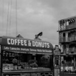 Themes - A black and white photo of a coffee stand