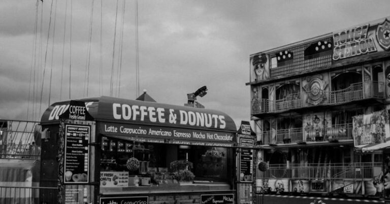 Themes - A black and white photo of a coffee stand