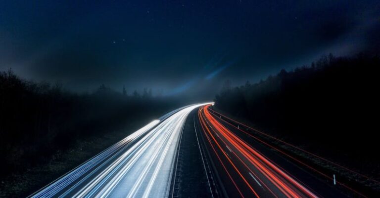 Speed - Light Trails on Highway at Night