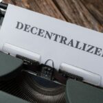 Scalability - A typewriter with a paper that says decentalized